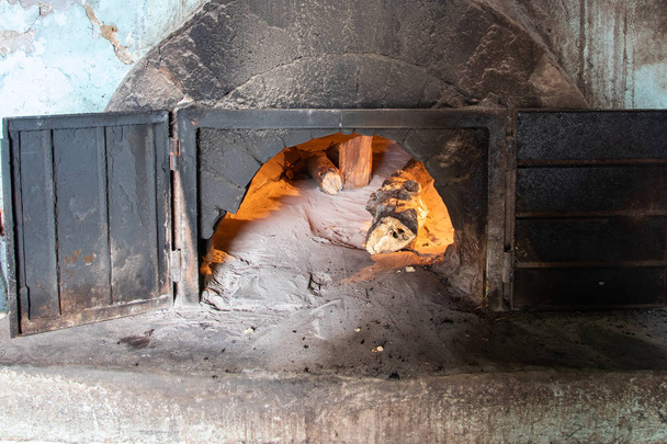 old wood-burning oven of classic handmade biscuits still working - Photo, Image