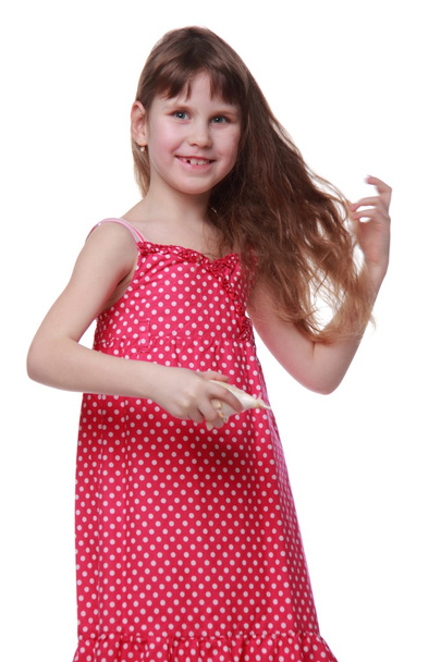 Portrait of a cute little girl with long hair - Fotó, kép