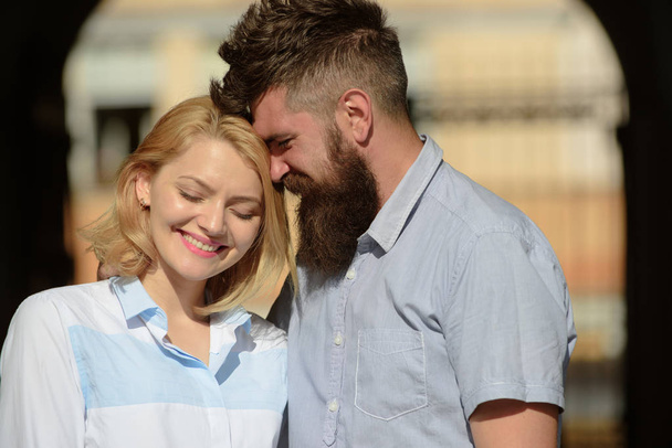 Feeling love and romance. Sensual woman and bearded man enjoy romantic date. Couple in love on summer day. Loving couple of woman and hipster dating outdoor. Simple joy of loving - Foto, immagini