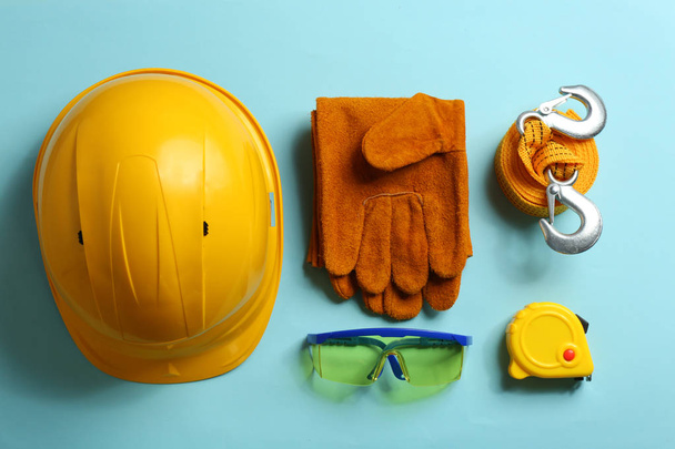 Flat lay composition with safety equipment on color background - Фото, изображение
