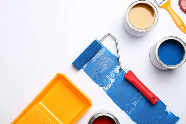 Composition with paint cans and space for text on white background - Photo, Image