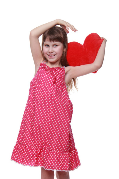 Cute little girl holding a heart - Fotoğraf, Görsel