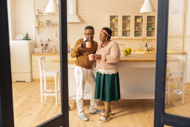 Nice married couple drinking coffee in the morning - Photo, Image