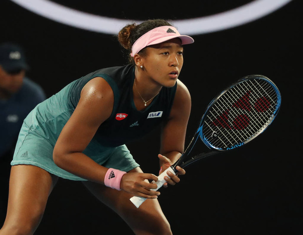 MELBOURNE, AUSTRALIA - JANUARY 24, 2019: Grand Slam champion Naomi Osaka of Japan in action during her semifinal match at 2019 Australian Open in Melbourne Park  - 写真・画像