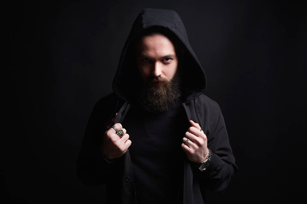 Handsome Man in Hood. Boy in a hoodie. portrait of bearded man - Foto, immagini