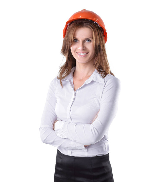 portrait of a young woman architect in the orange helmet - Photo, Image