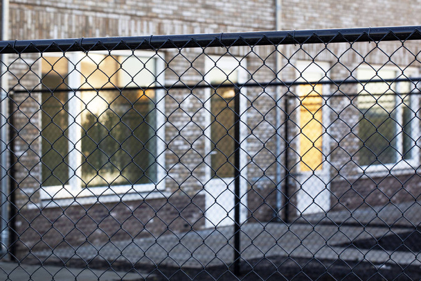 Garden security metal wire fences in a newly built neighborhood in the Netherlands - Φωτογραφία, εικόνα