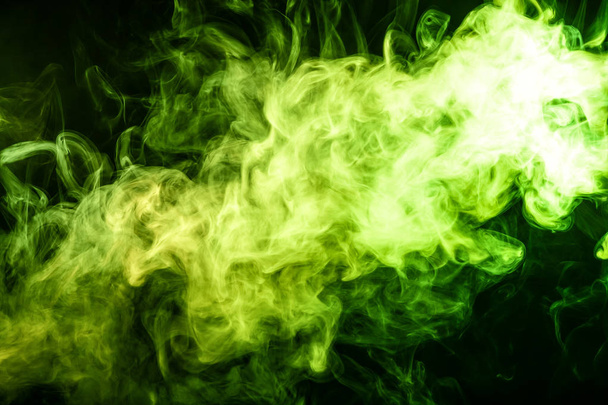 Green bomb smoke on black isolated  background - Photo, image