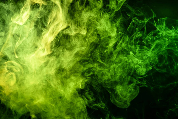 Green bomb smoke on black isolated  background - Фото, зображення