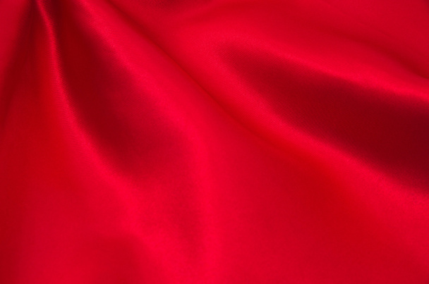 Piros szatén vagy selyem szövet háttérként - Fotó, kép