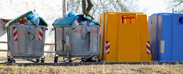 bins full of trash bags due to a strike in the garbage collection services and other recycling bins - Fotografie, Obrázek