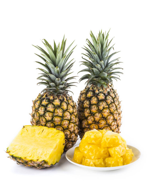 Slice of pineapple on white dish - Photo, Image