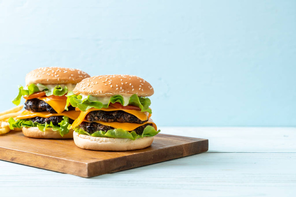 homemade and fresh tasty burger with cheese - Foto, Bild