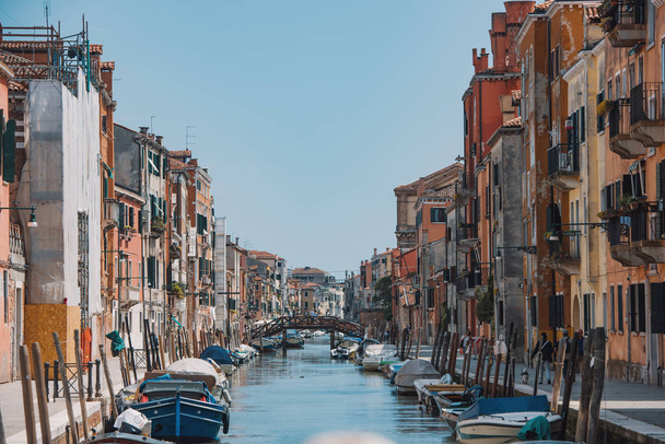 Venice, Italy - May 5, 2018: Venice landscape - beautiful and colorful buildings on a canal. - Foto, Bild