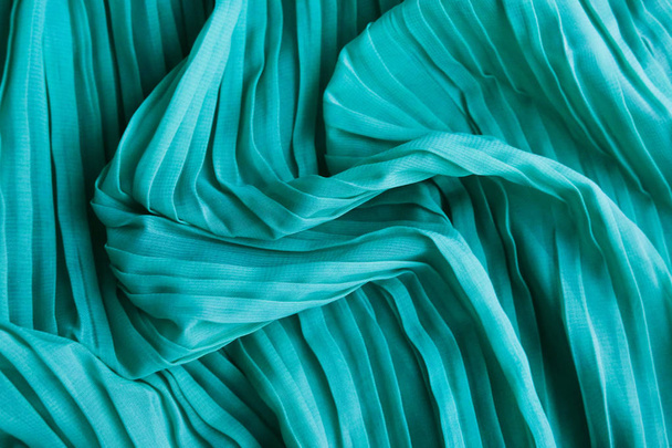The texture of the mint pleated fabric. Green georgette fabrics.  - Photo, Image