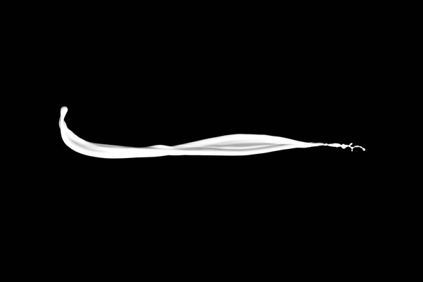 splash of milk on a black background - Valokuva, kuva