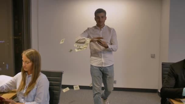 Happy attractive caucasian man holding and throwing cash. Rain of money - Felvétel, videó