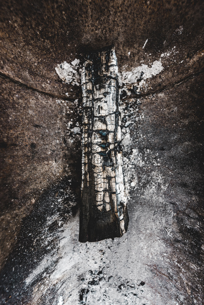 top view of burnt wooden log covered with white ash - Photo, Image