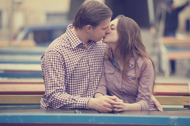 Young couple kissing on the street - Fotoğraf, Görsel