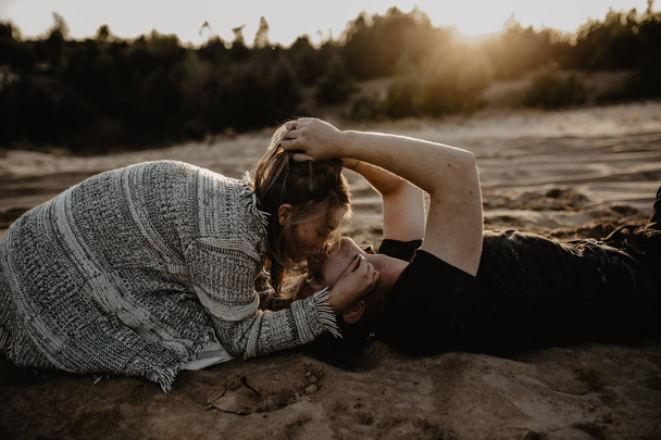 Young ,happy  couple kissing  on the beach  - Zdjęcie, obraz