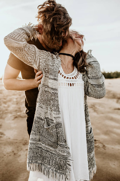 happy couple in love spend good time on the beach and enjoy each other - Фото, изображение