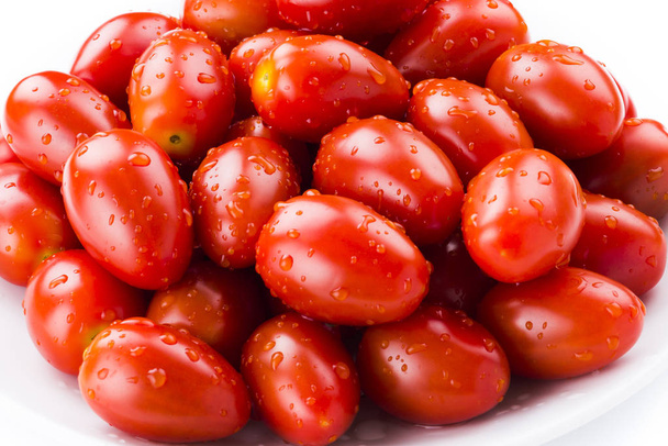 cherry tomatoes Isolated on white background - Foto, imagen
