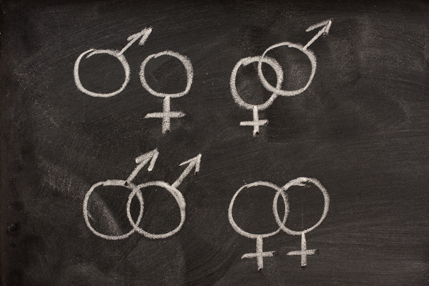 Couples of male and female gender symbols on a b - Φωτογραφία, εικόνα