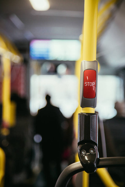 Stop Button in a bus, public transport, blurry - Foto, Bild