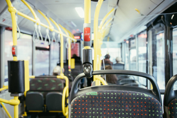 Stop Button in a bus, public transport, blurry - Foto, imagen