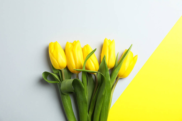 Beautiful tulips for Mother's Day on light background, top view - Photo, Image