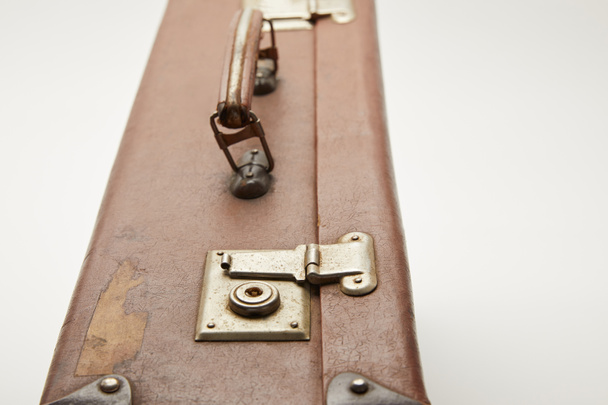 close up of brown suitcase isolated on grey - Foto, immagini