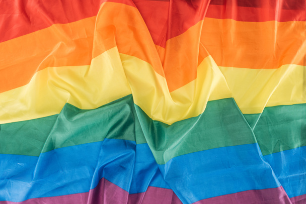 top view of creased lgbt pride flag, lgbt concept - Фото, изображение