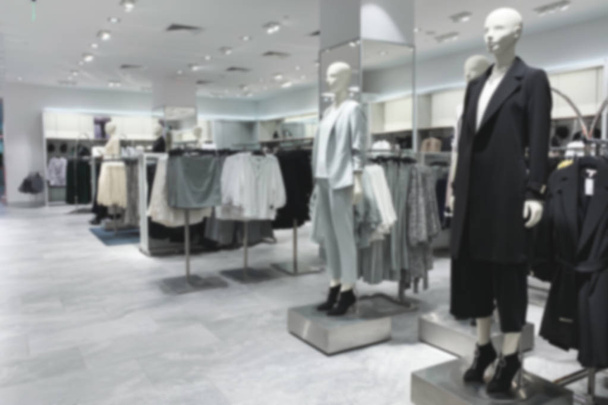 Blurred Background.Department of official clothes in fashion boutique. Fashionable clothing store interior - Photo, Image