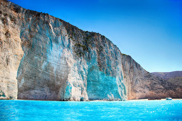 Beach Navagio and turqouise water. There is sunny day in summer. - Photo, Image
