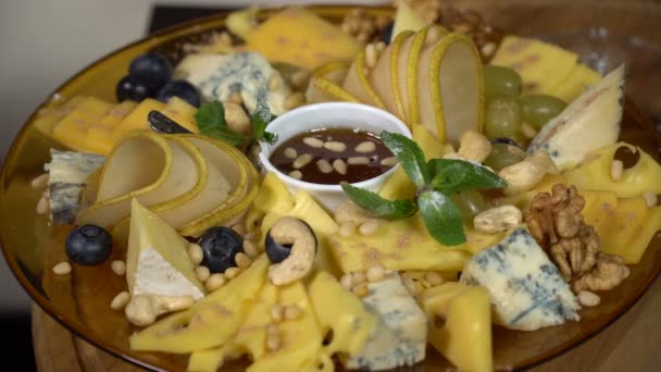 Cheese Slices with Nuts, Honey and Fruits - Кадри, відео