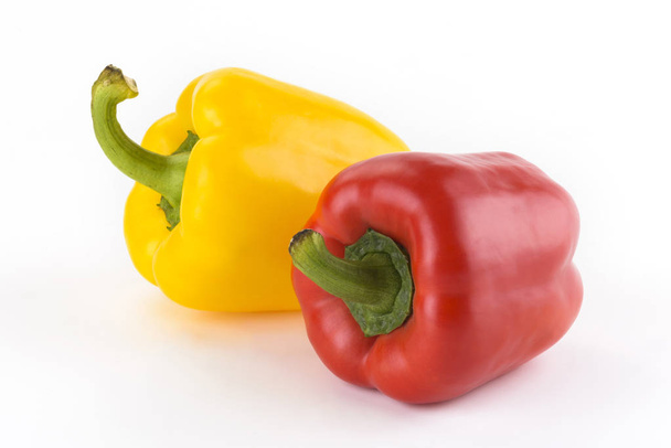 red, yellow bell pepper on white background - Foto, Bild