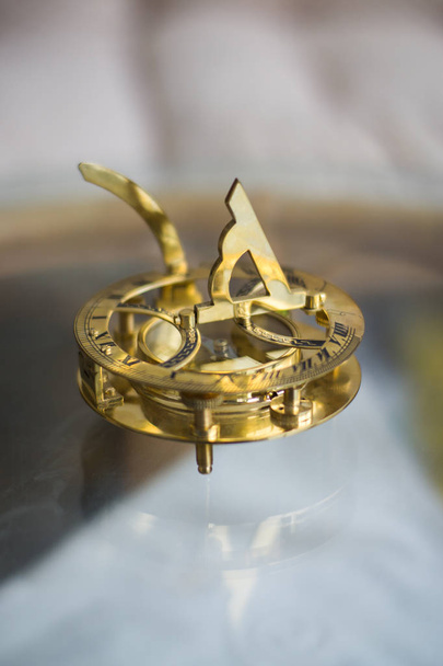 OLD COMPASS WITH SUN CLOCK FOR NAVAL - Фото, изображение
