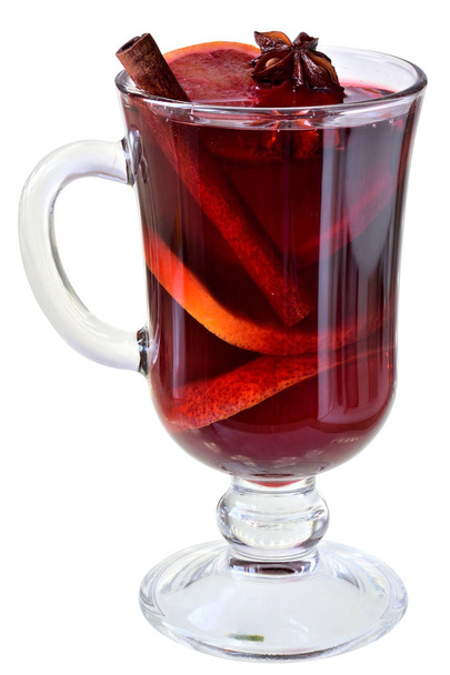 Hot drink mulled red wine with spices and red orange in a glass goblet isolated on white background. - Foto, Imagen