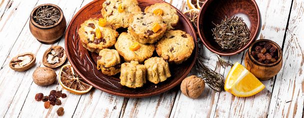 Homemade oatmeal cookies.Cookies with raisins, nuts and orange - 写真・画像