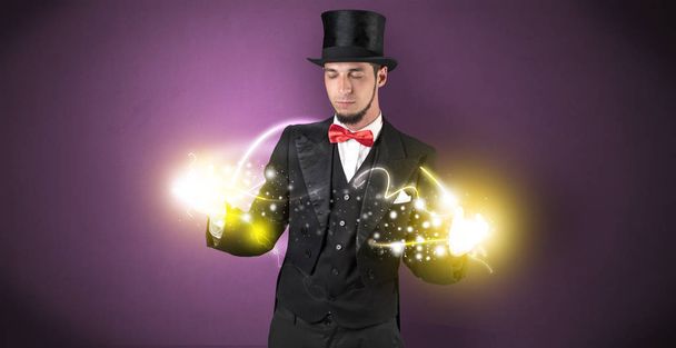 Magician holding his power on his hand - Φωτογραφία, εικόνα