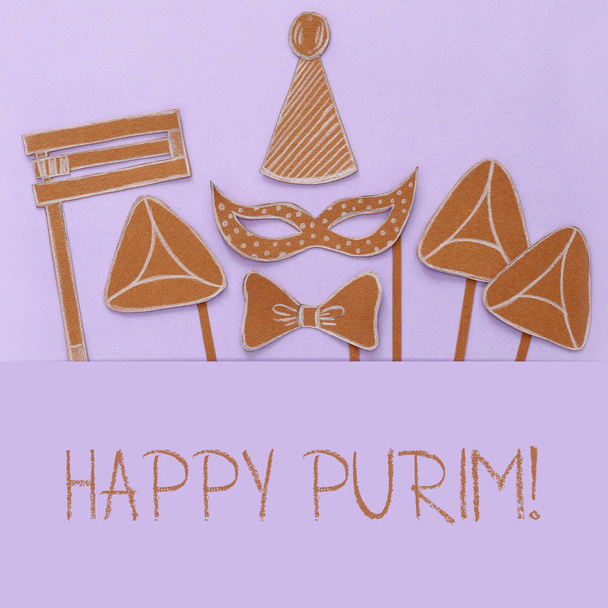 Purim celebration concept (jewish carnival holiday). Traditional symbols shapes cutted from paper - Foto, immagini