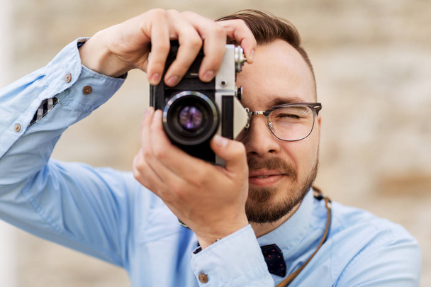 photographer or hipster with film camera outdoors - Φωτογραφία, εικόνα