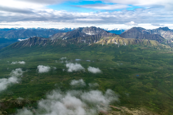 Beautiful aerial view of the vast wilderness and mountains of Wrangell St Elias National Park in Alaska - Photo, Image