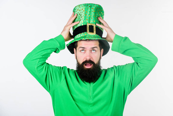 Happy patricks day. Global celebration of irish culture. Man bearded hipster wear green clothing and hat patricks day. Saint patricks day holiday. Green color part of celebration. Myth of leprechaun - Foto, Bild