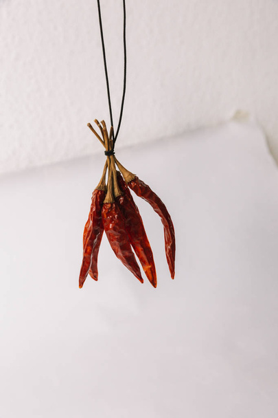 Bunch of dried chilli on white background - Valokuva, kuva