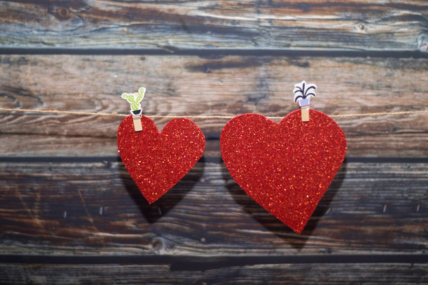 cımbız bir çifti asılı güzel kalpler - Fotoğraf, Görsel