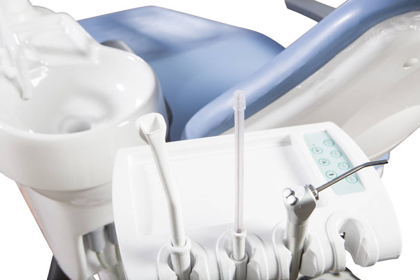 Οδοντίατρος επαγγελματικό ιατρικό εξοπλισμό που απομονώνονται σε λευκό - Φωτογραφία, εικόνα