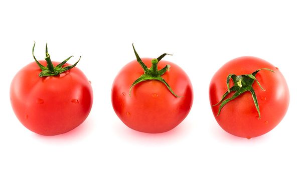 Three fresh tomatos covered with water drops isolated - Фото, изображение