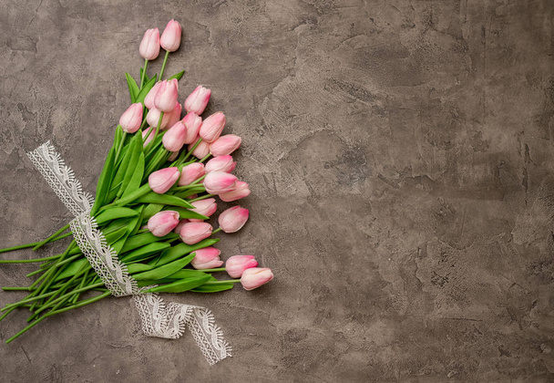 tulips on concrete background - Foto, Imagen