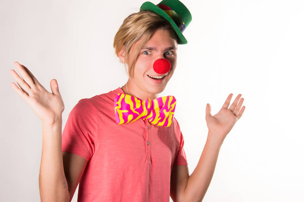 Young funny clown. White background. - Photo, Image